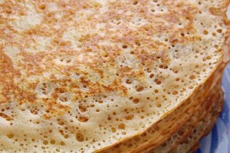 Тонкие дрожжевые блины с дырочками - рецепт и фото