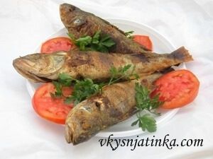 Рыба на костре - фото